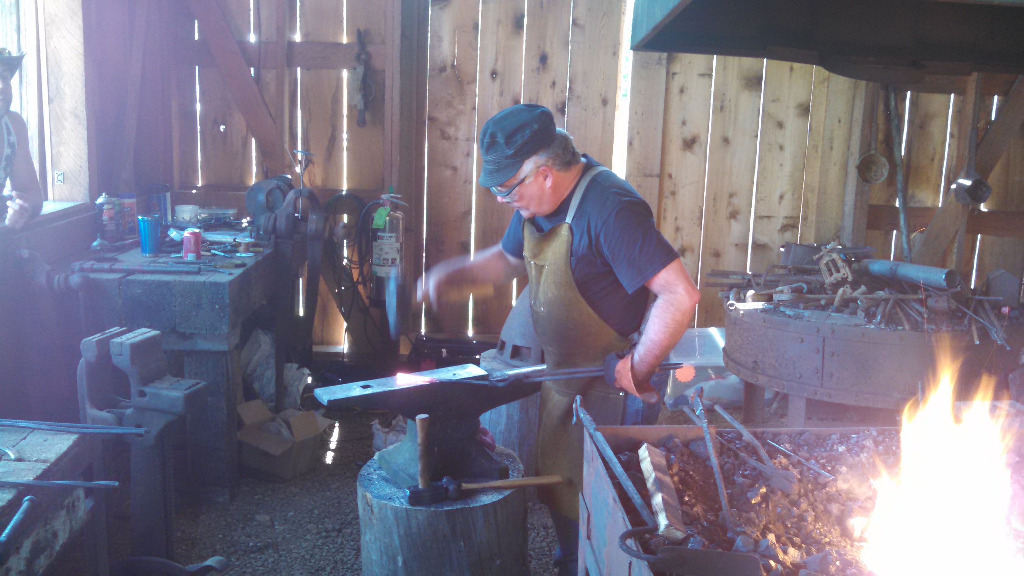 Harmonie Doty at the Camp 18 blacksmith forge