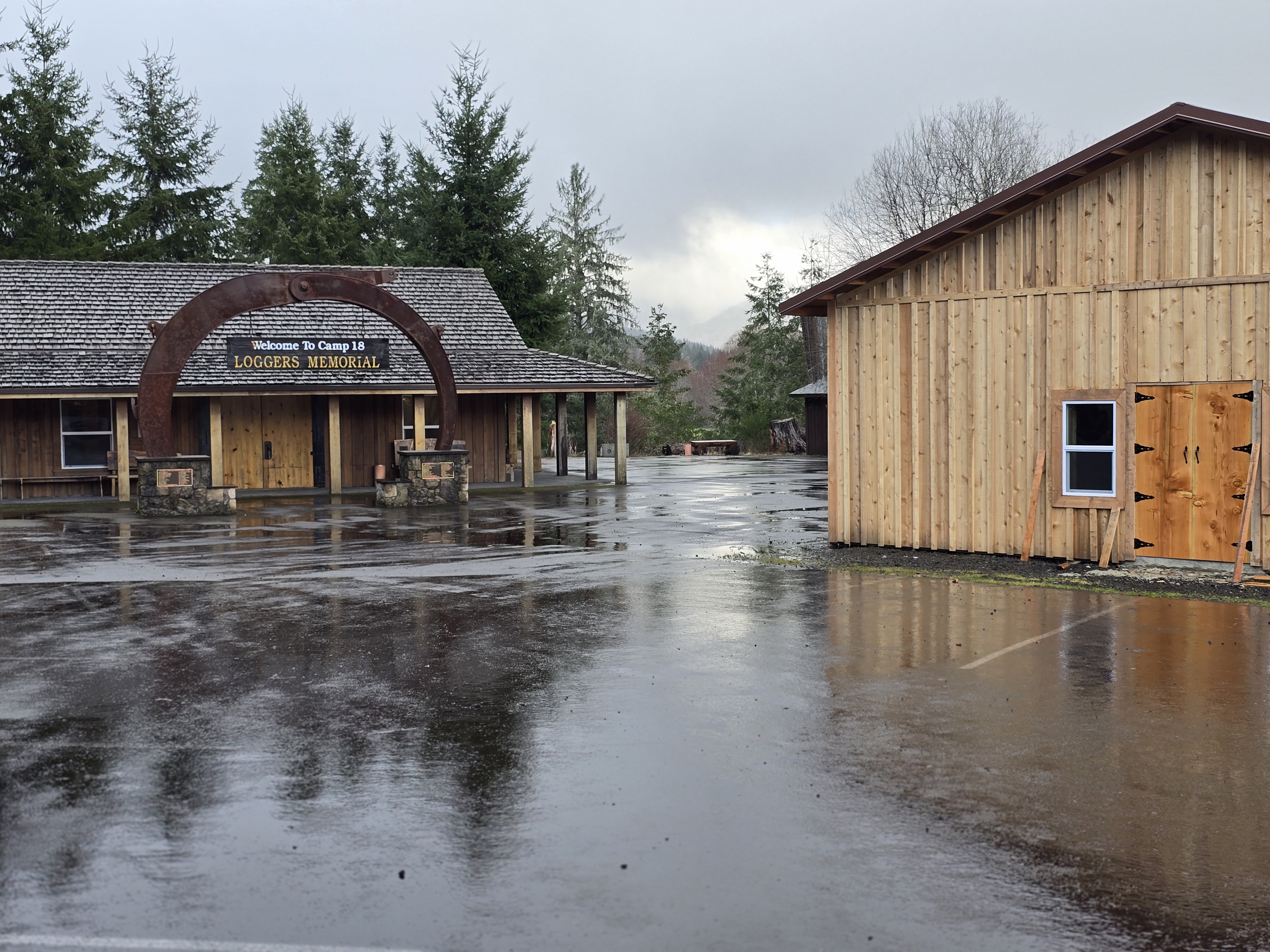 Camp 18 Loggers Memorial entrance with saw blade arch