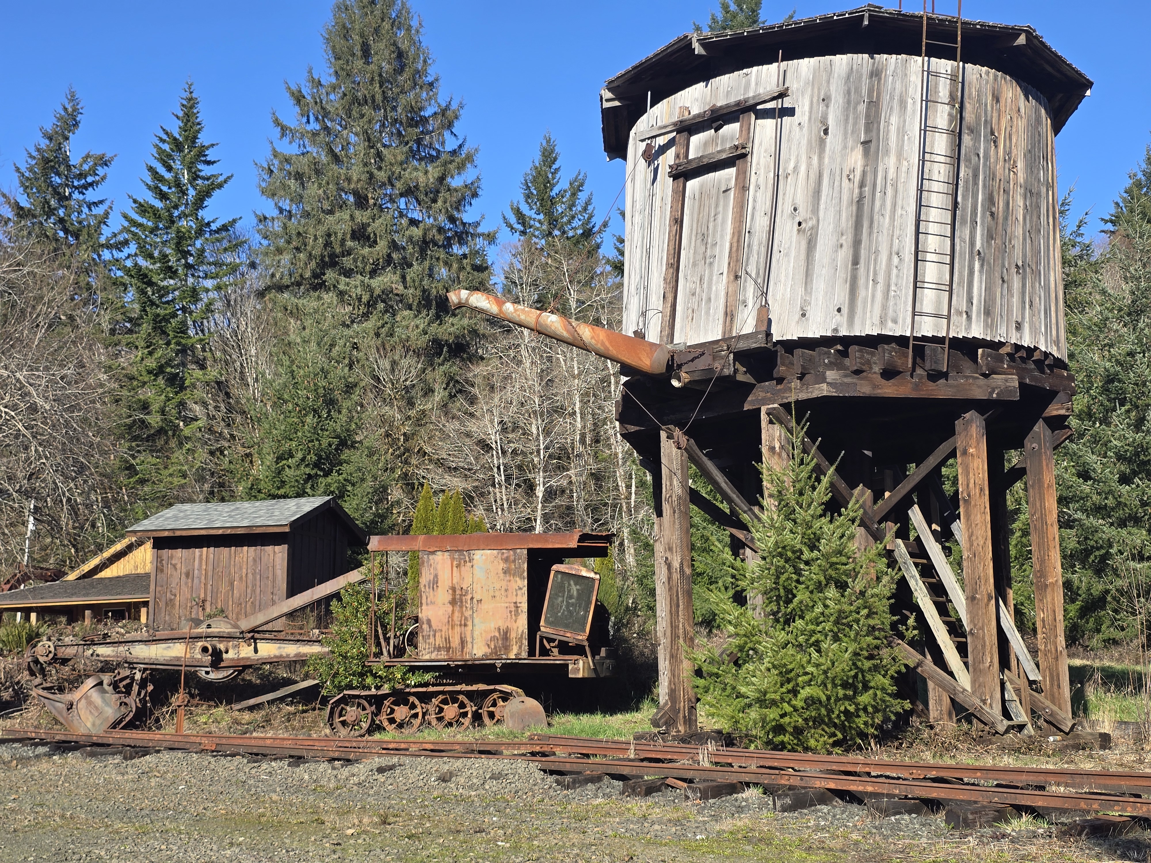 Southern Pacific water tower with tracked excavator